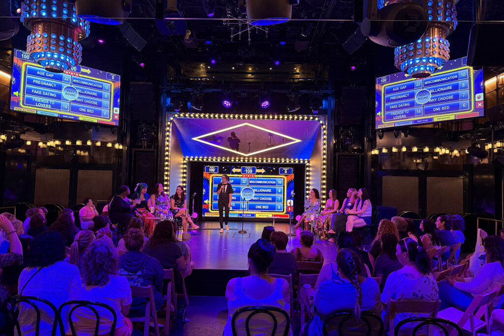 Book lovers celebrating friendships during a LoveLit Cruise Book Convention at sea